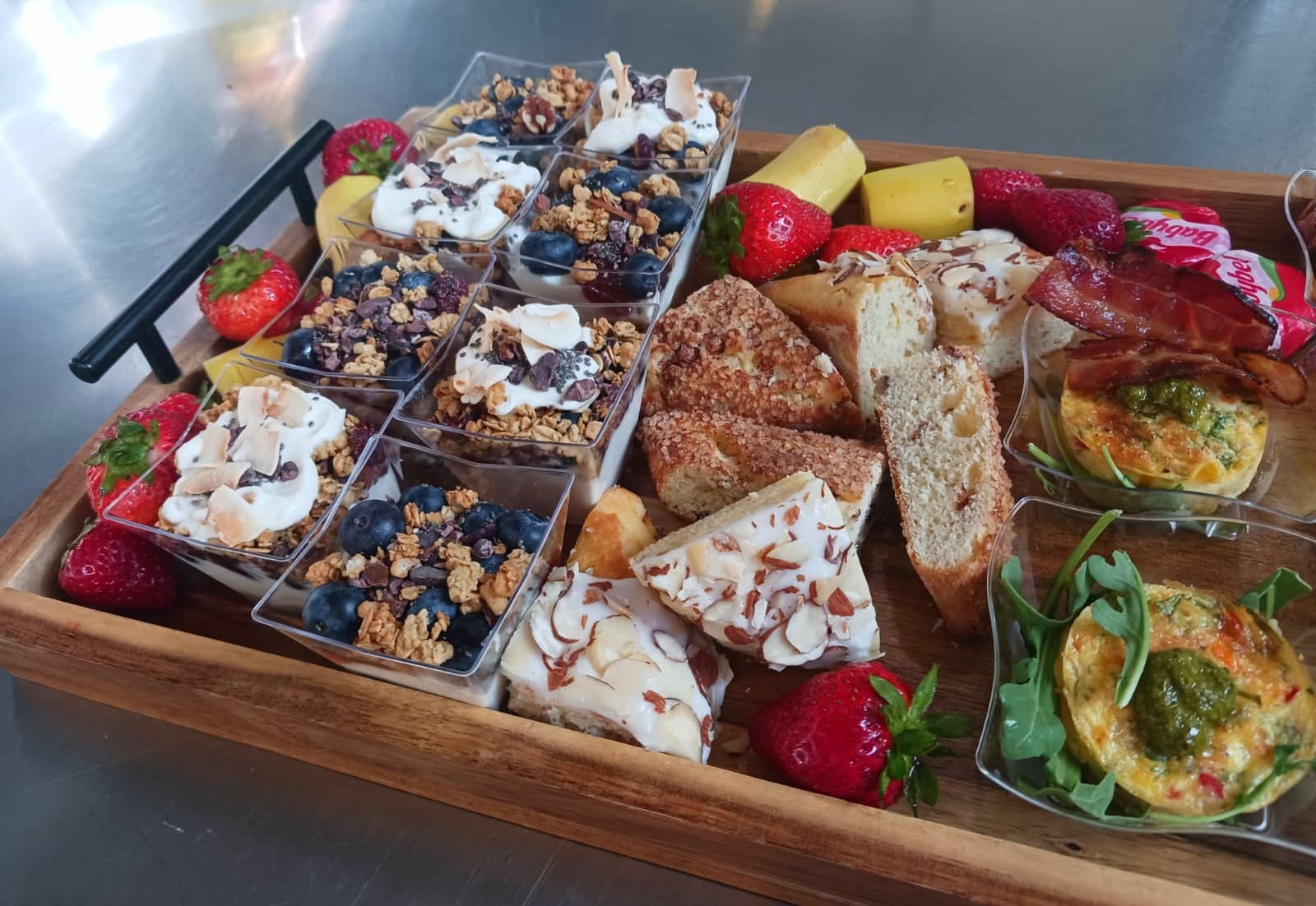Breakfast board with yogurt parfaits